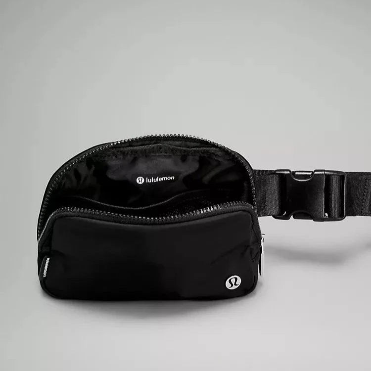Close-up look at the zipper of the Lululemon Everywhere Belt Bag 1L in Black, showcasing the high-quality, smooth-gliding zipper for easy access to belongings.