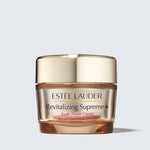 Estée Lauder Revitalizing Supreme+ Youth Power Creme SPF 25 Moisturizer front view. The jar features a luxurious design with a gold lid and clear base, showcasing the advanced anti-aging cream that provides hydration and sun protection for youthful skin.
