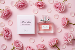 Miss Dior Absolutely Blooming flat lay with pink roses